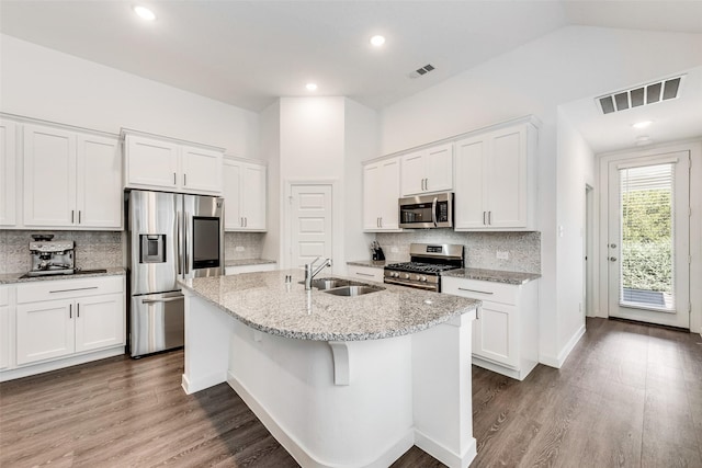 1321 Shire Dr, Aubrey, TX 76227 - kitchen with backsplash, visible vents, appliances with stainless steel finishes, and a sink