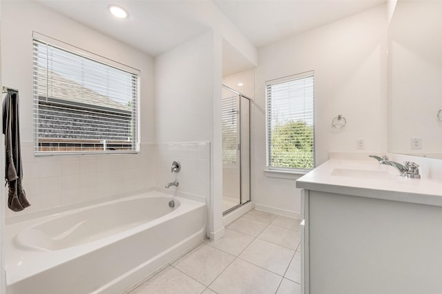 1321 Shire Dr, Aubrey, TX 76227 - bathroom featuring a bath, tile patterned floors, a stall shower, and a sink