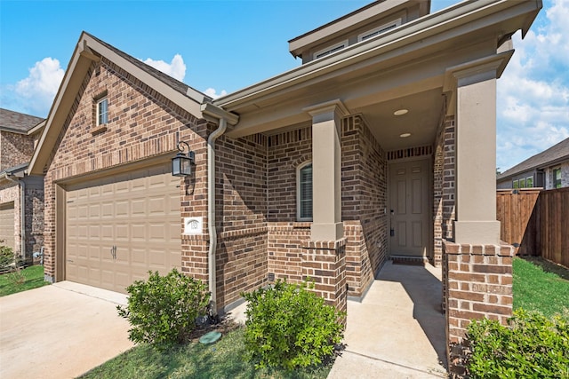 1321 Shire Dr, Aubrey, TX 76227 - view of front facade with brick siding, an attached garage, concrete driveway, and fence