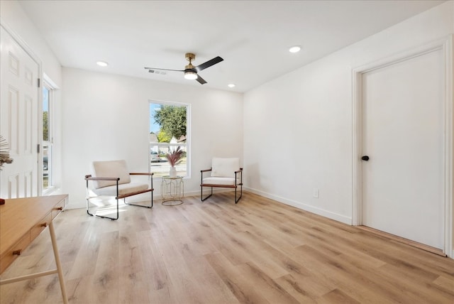 unfurnished room featuring ceiling fan and light hardwood / wood-style flooring