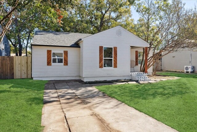 view of front of house featuring a front yard and covered porch