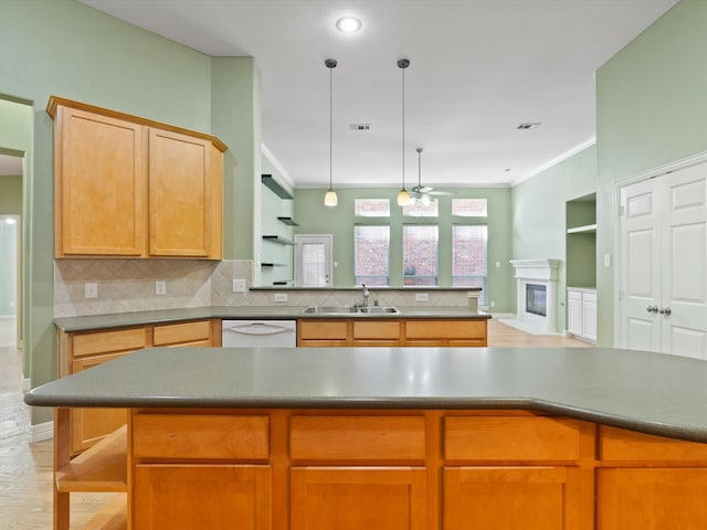 kitchen featuring backsplash, ceiling fan, crown molding, sink, and light hardwood / wood-style flooring