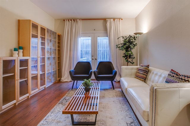 living room with french doors and dark hardwood / wood-style flooring