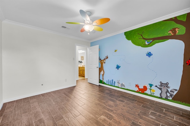 interior space with ceiling fan, wood-type flooring, and crown molding