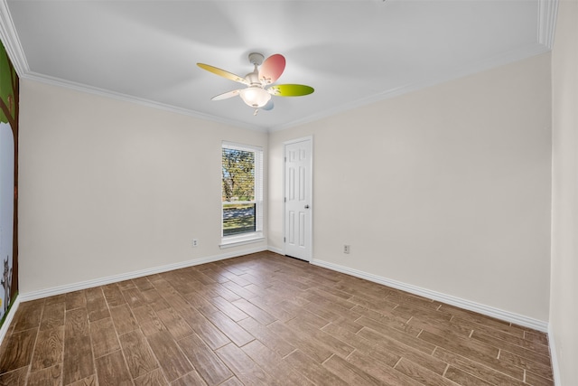 empty room with crown molding, hardwood / wood-style floors, and ceiling fan