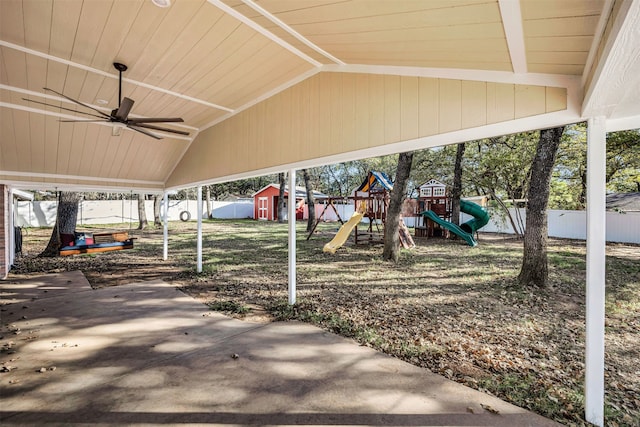 view of patio / terrace featuring a playground, ceiling fan, and a shed