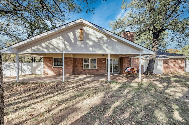 back of house featuring a patio area