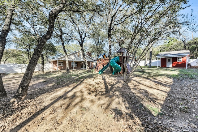 view of yard with a playground