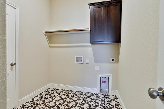 laundry area with cabinets, hookup for a washing machine, tile patterned flooring, and electric dryer hookup