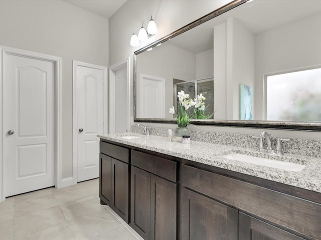 bathroom with vanity and an enclosed shower