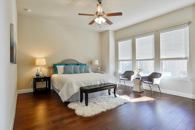 bedroom featuring ceiling fan and dark hardwood / wood-style flooring