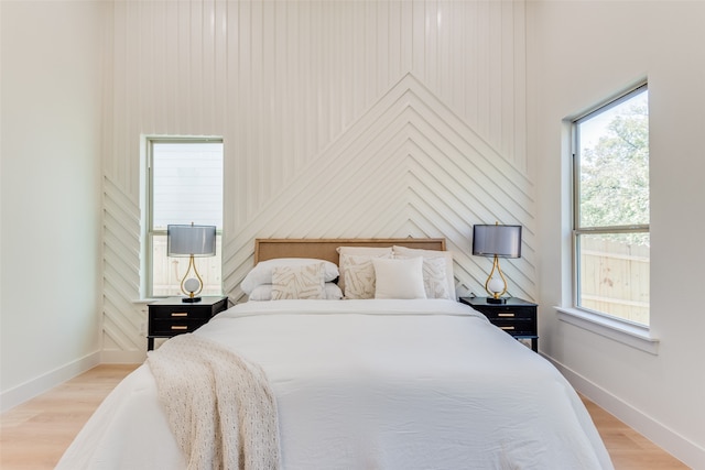 bedroom with light hardwood / wood-style floors