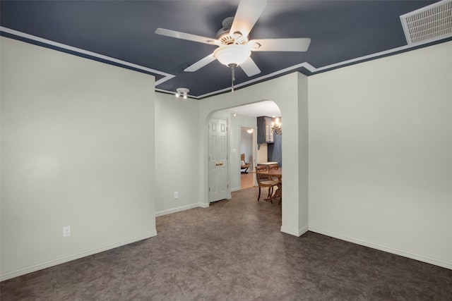 unfurnished room featuring ceiling fan with notable chandelier and ornamental molding