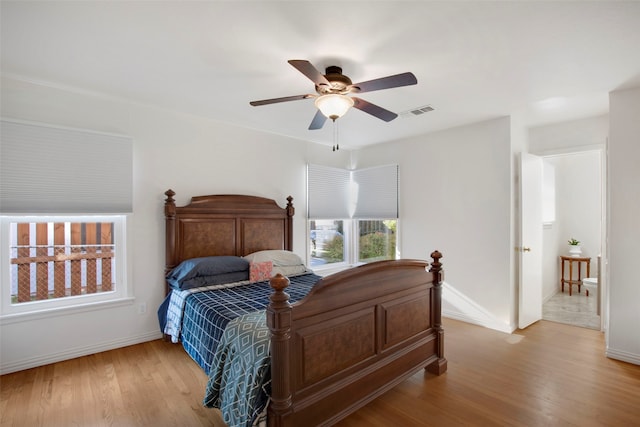 bedroom with light wood-type flooring and ceiling fan