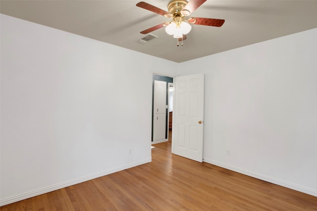 unfurnished room featuring ceiling fan and light hardwood / wood-style floors