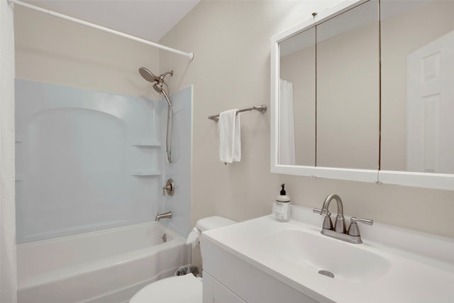 full bathroom featuring vanity, toilet, and washtub / shower combination