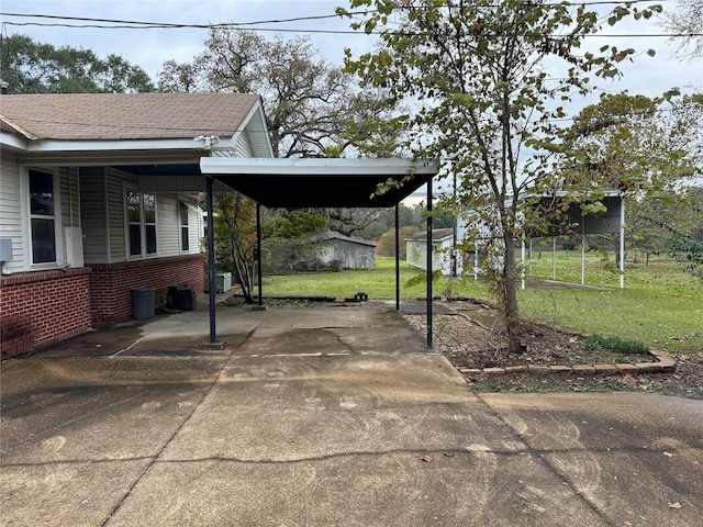 view of patio featuring a carport