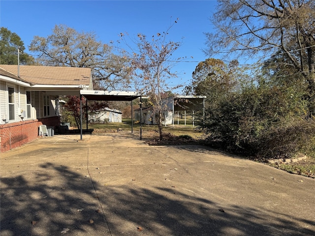 exterior space featuring a carport