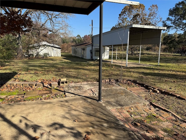 view of yard with a carport