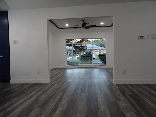 interior space featuring ceiling fan and dark hardwood / wood-style flooring