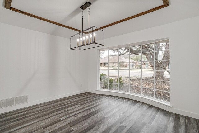 unfurnished room featuring ceiling fan and dark wood-type flooring