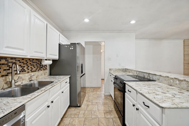 kitchen with decorative backsplash, light stone counters, stainless steel appliances, sink, and white cabinets