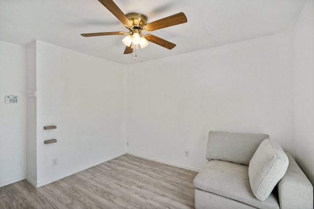 unfurnished room with ceiling fan and light hardwood / wood-style floors