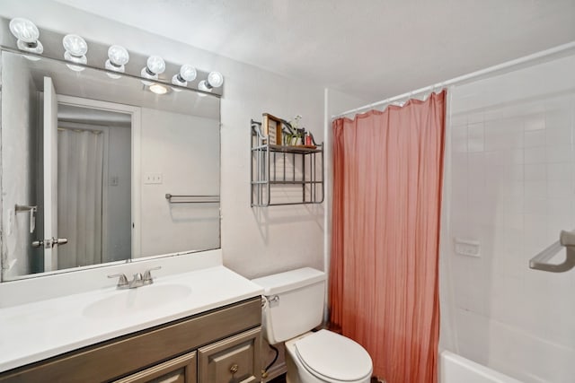 full bathroom with vanity, toilet, and shower / bath combo with shower curtain