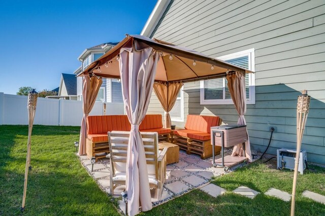 view of patio featuring a gazebo and outdoor lounge area