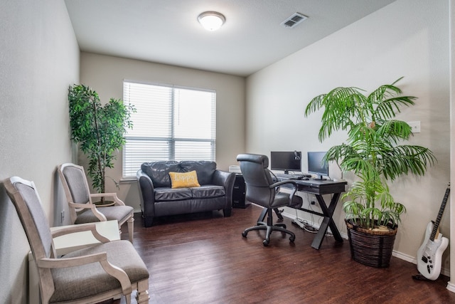 home office with dark wood-type flooring