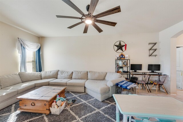 living room featuring ceiling fan