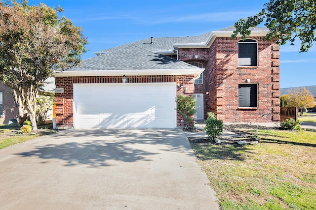 view of front property with a garage