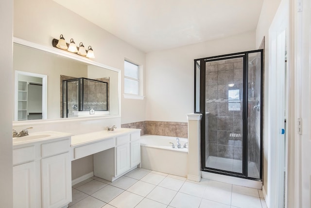 bathroom featuring tile patterned floors, vanity, and independent shower and bath