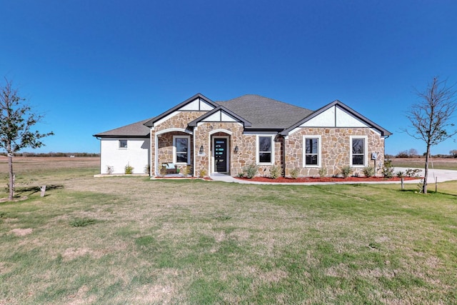 view of front of property with a front lawn