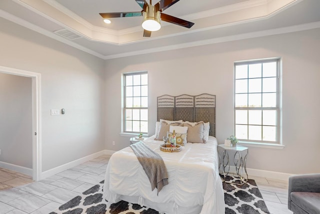 bedroom featuring multiple windows, ornamental molding, and ceiling fan