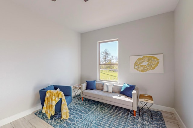 living area with hardwood / wood-style floors