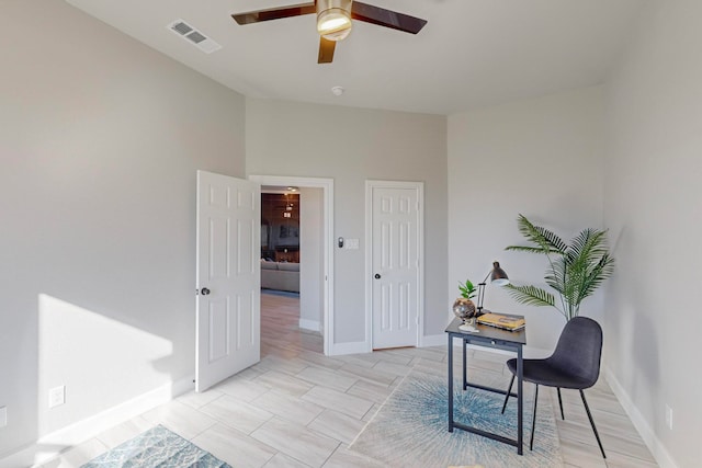 office space with ceiling fan