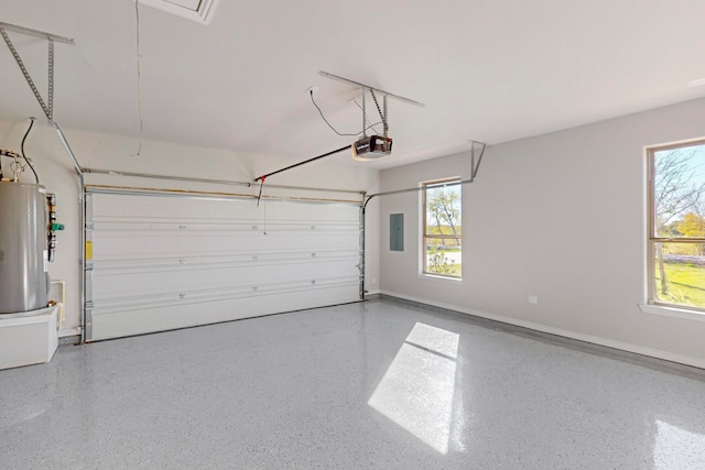 garage with electric panel, a garage door opener, and water heater