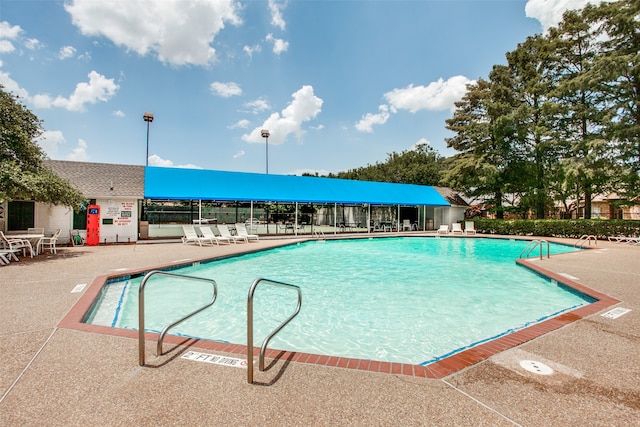 view of pool with a patio area