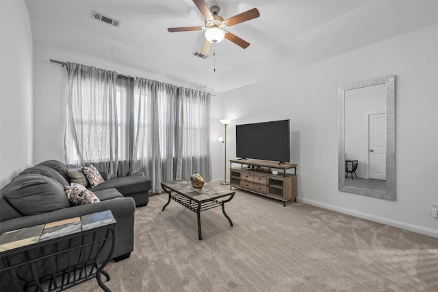 carpeted living room featuring ceiling fan