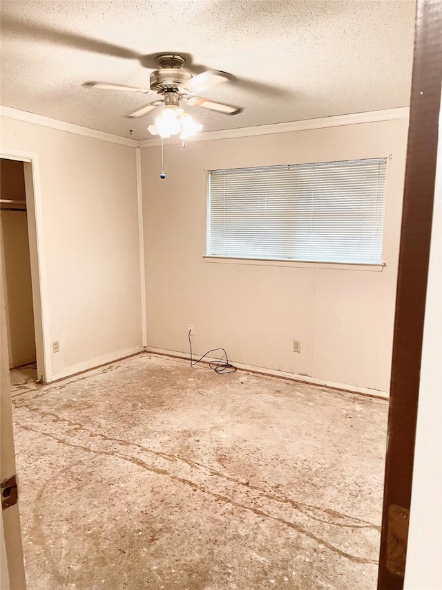 unfurnished bedroom featuring ceiling fan, ornamental molding, and a textured ceiling