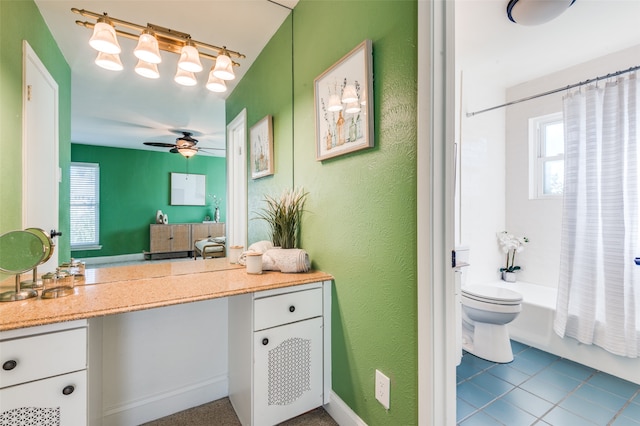 full bathroom featuring tile patterned floors, vanity, ceiling fan, shower / bathtub combination with curtain, and toilet