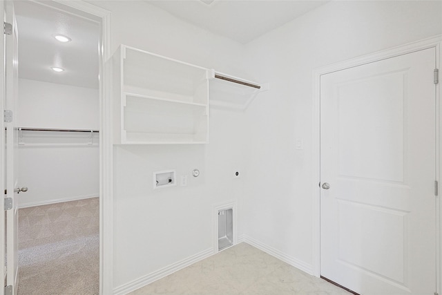 laundry area featuring gas dryer hookup, light colored carpet, hookup for an electric dryer, and hookup for a washing machine