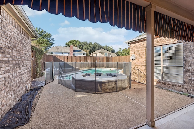 view of pool featuring a patio area