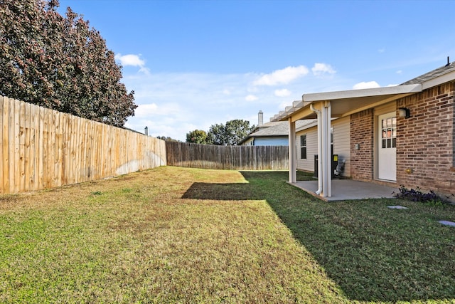 view of yard with a patio area