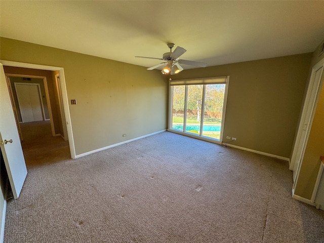 unfurnished bedroom featuring ceiling fan, access to exterior, and light carpet