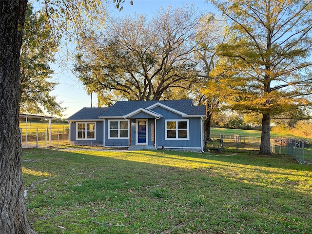 view of front of home with a front yard