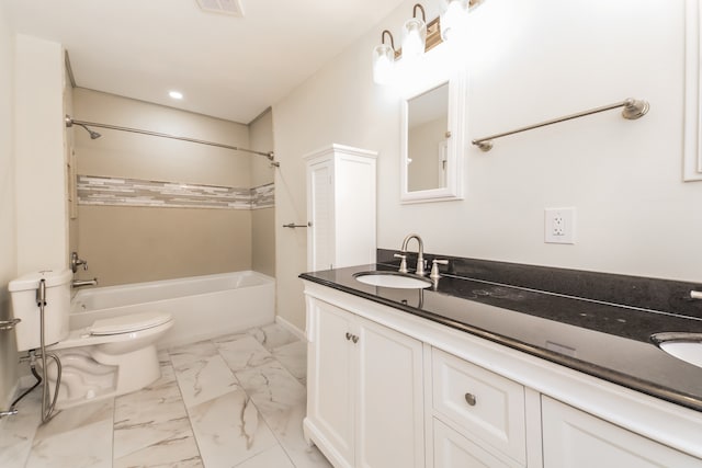 full bathroom with vanity, bathtub / shower combination, and toilet