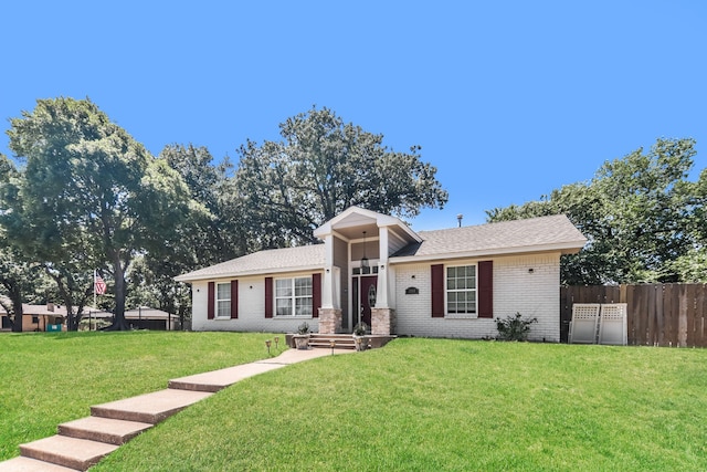 view of front of home featuring a front yard