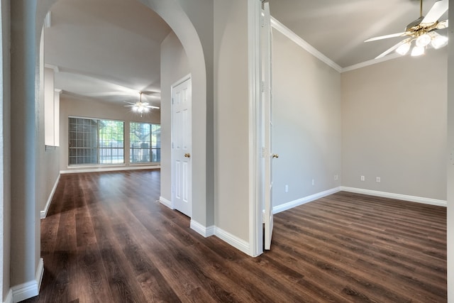 hallway with dark hardwood / wood-style flooring and ornamental molding